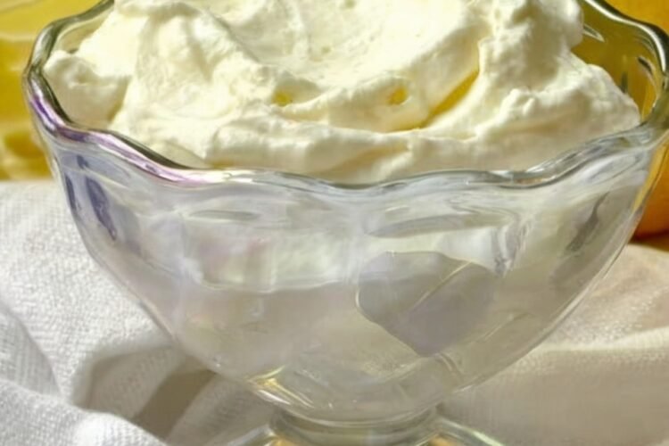 Lemon syllabub dessert cups topped with berries
