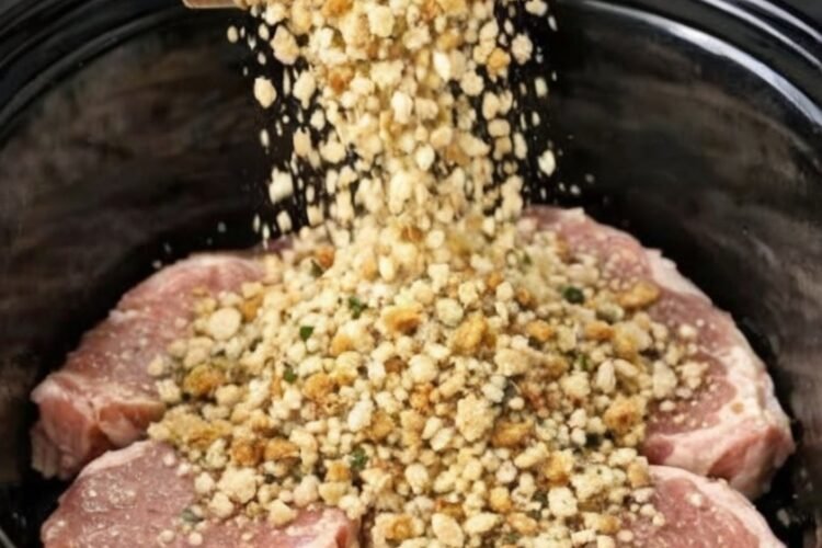 Slow cooker pork chops topped with buttery stuffing